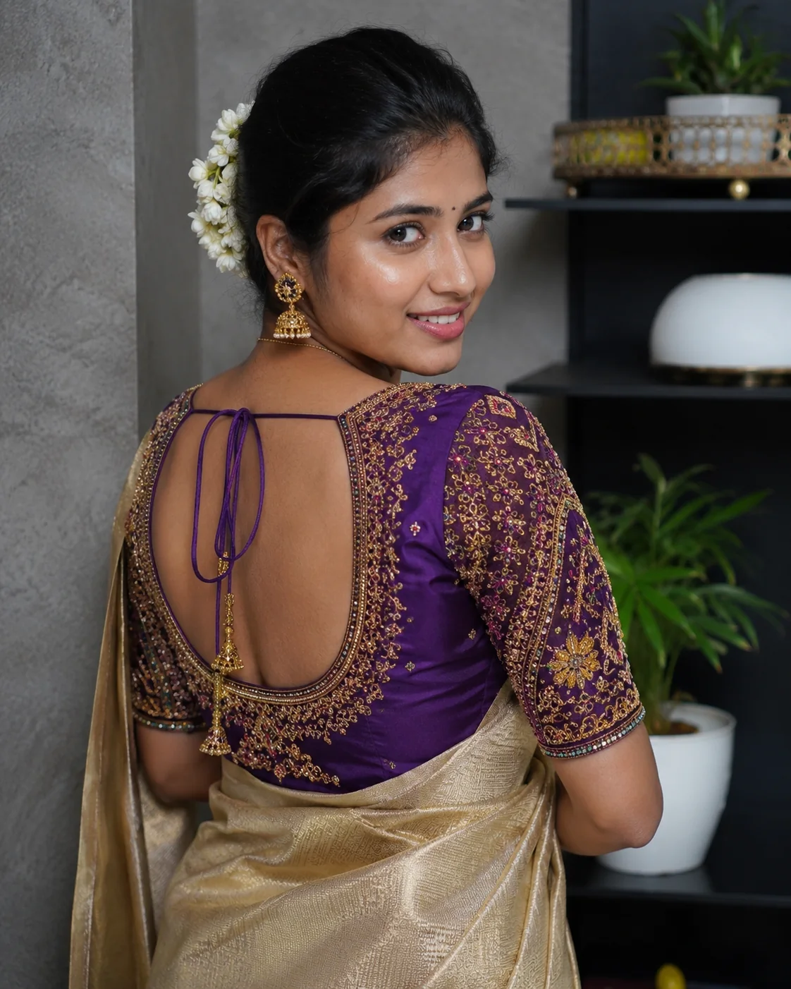 Design reference - purple silk blouse, gold and pink floral embroidery across the sleeve and shoulders, deep round back opening with a tasselled tie.